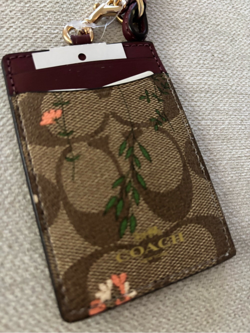 Coach Khaki Multi Signature Floral Lanyard ID with Burgundy Trim